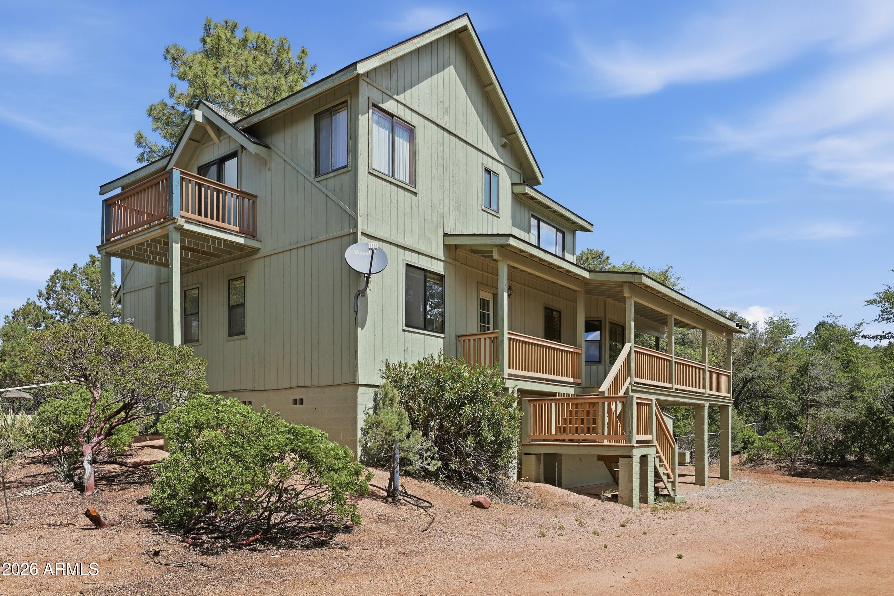 1405 East Graham Rnch Trail Payson, AZ 85541 - Photo 27 of 46 front view of a house with a street