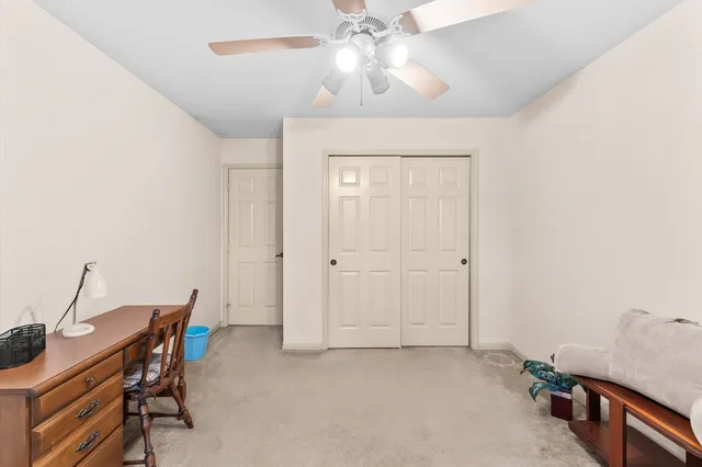 a view of sitting area in front of house