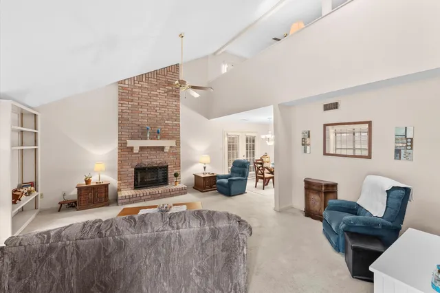 a bed room with furniture and a fireplace