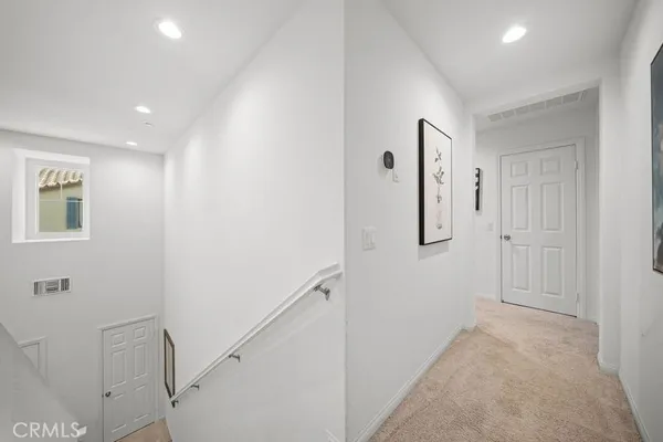 a view of hallway with stairs
