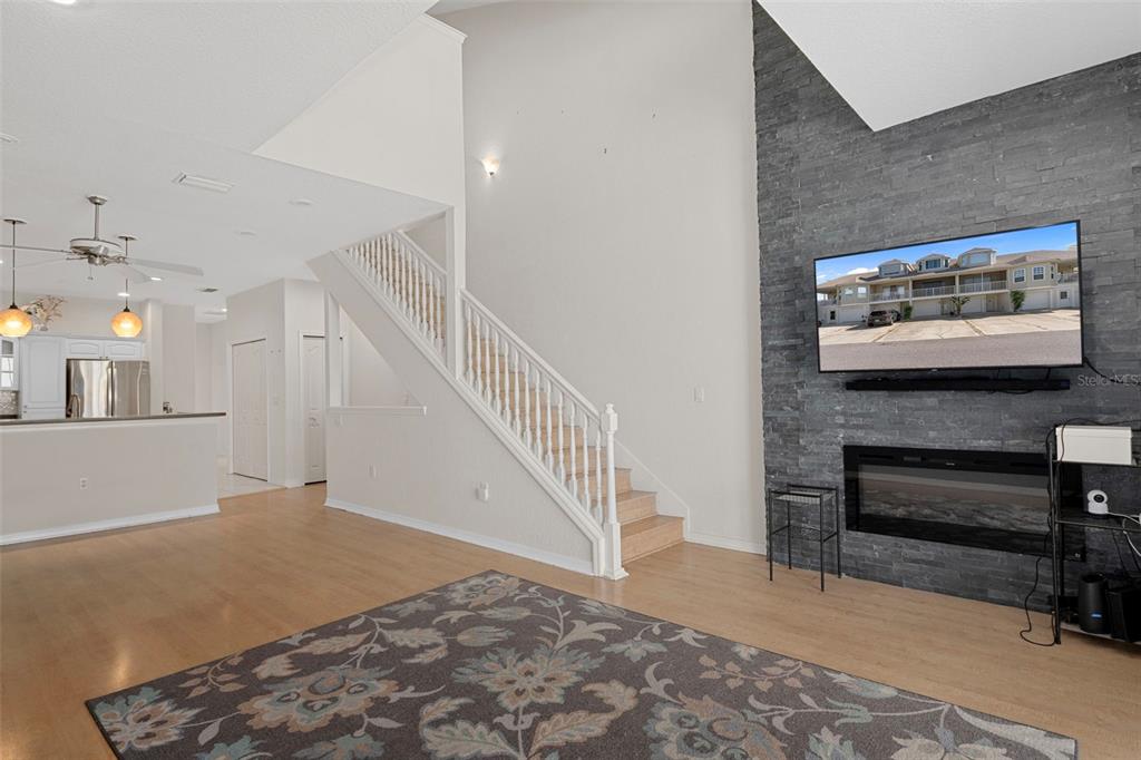 8304 Aquila Street Port Richey, FL 34668 - Photo 12 of 65 a view of a livingroom with furniture and staircase