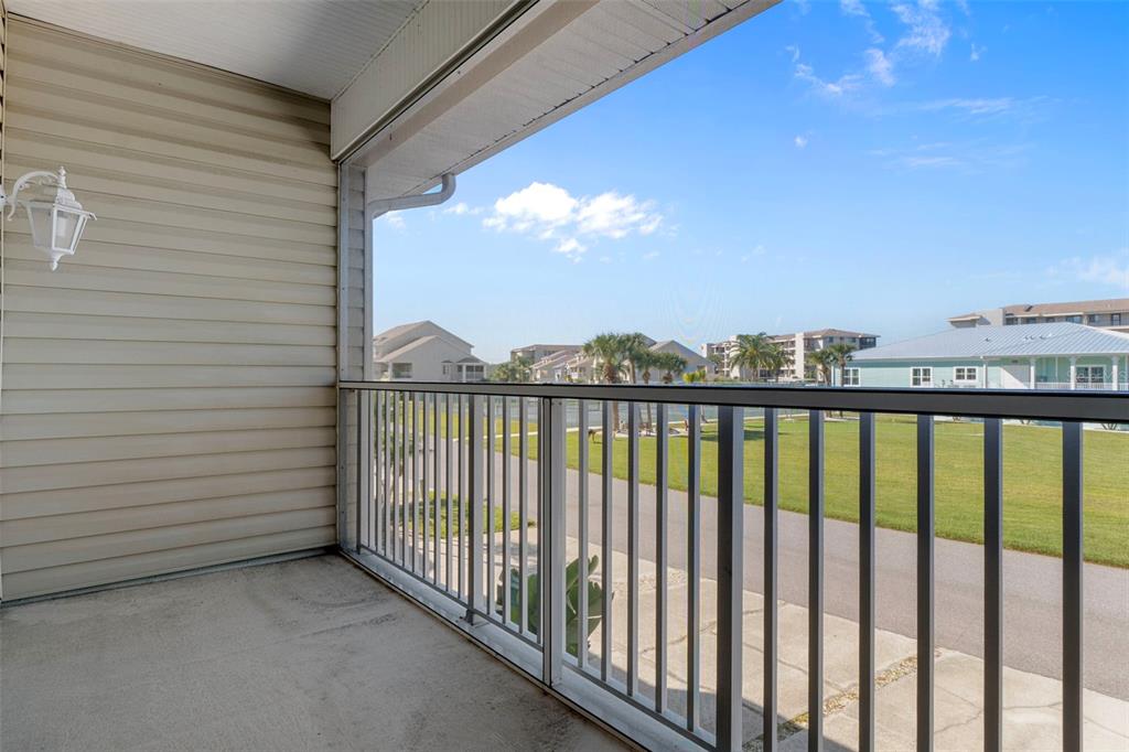 8304 Aquila Street Port Richey, FL 34668 - Photo 15 of 65 a view of a balcony with an outdoor space