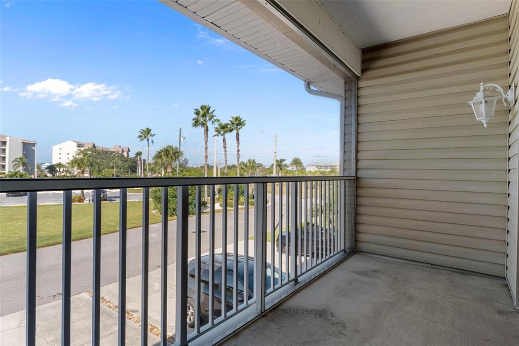 8304 Aquila Street Port Richey, FL 34668 - Photo 16 of 65 a view of a balcony with an outdoor space