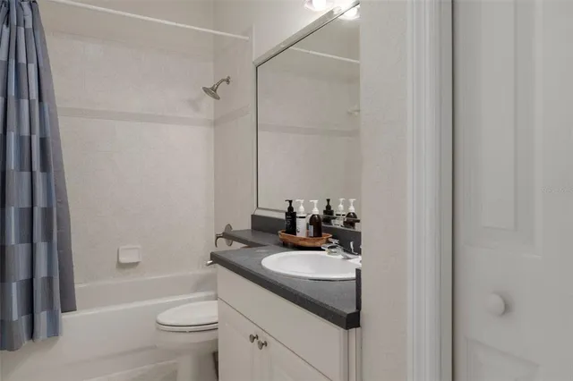 a view of a balcony with a potted plant