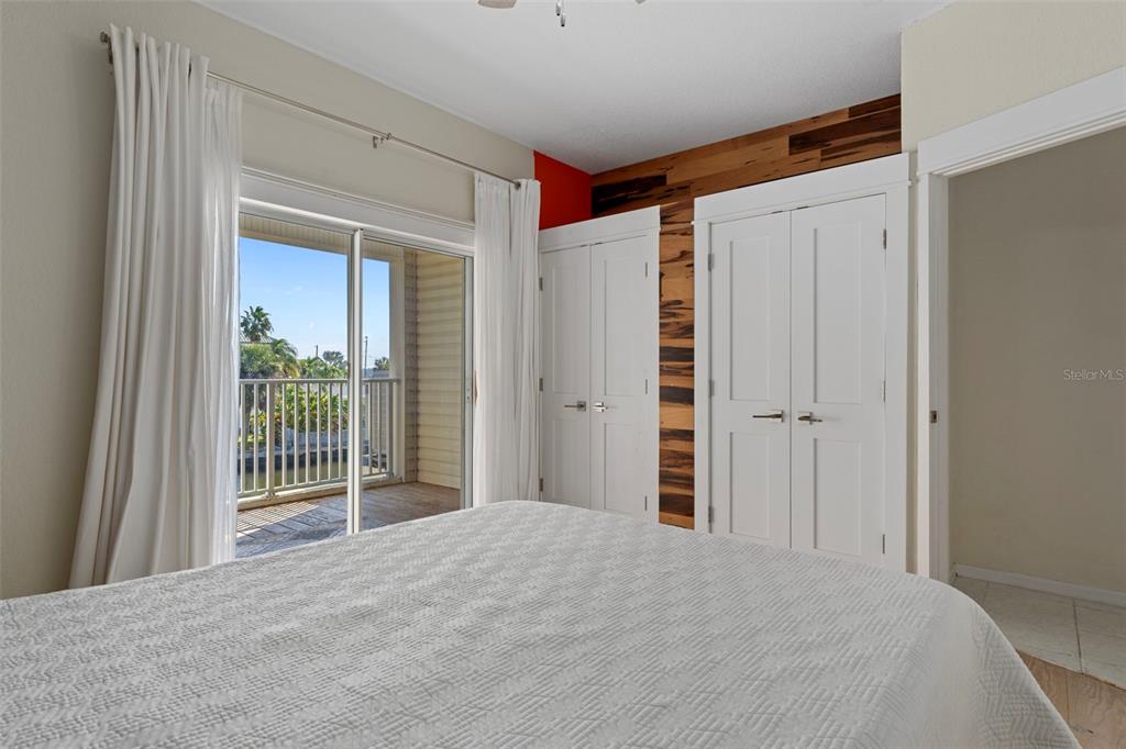 8304 Aquila Street Port Richey, FL 34668 - Photo 24 of 65 a bedroom with a bed and a window