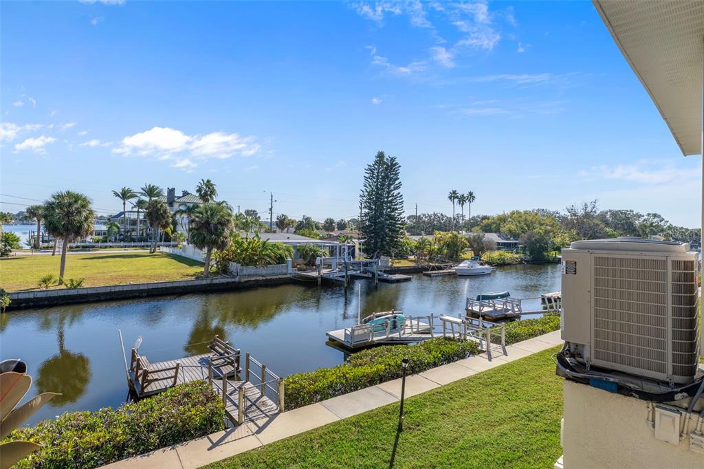 8304 Aquila Street Port Richey, FL 34668 - Photo 27 of 65 a view of a lake with a terrace