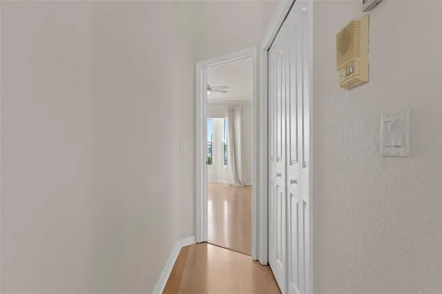 a view of an empty room with furniture and toys