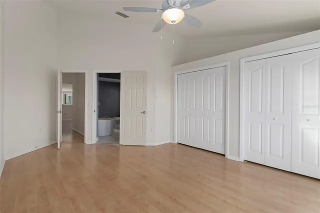 a view of a lake with a yard