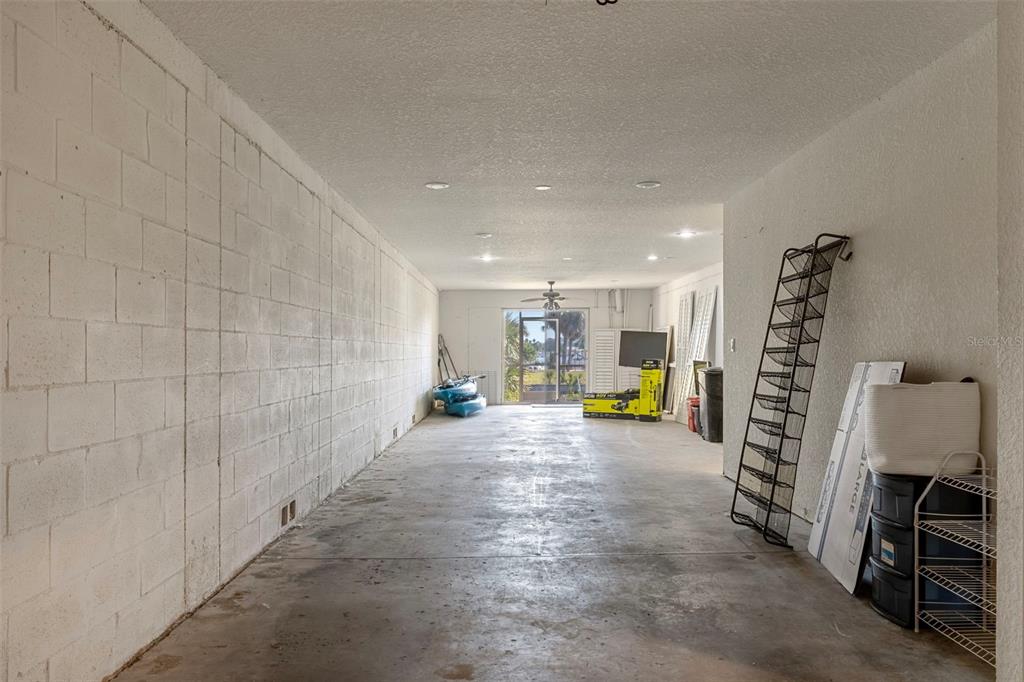8304 Aquila Street Port Richey, FL 34668 - Photo 40 of 65 a view of an empty room with furniture and toys