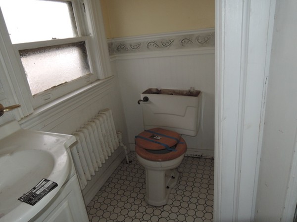 37 George Street Springfield, MA 01105 - Photo 11 of 28 a bathroom with a toilet and a sink