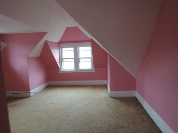 37 George Street Springfield, MA 01105 - Photo 18 of 28 a view of a livingroom with an empty space and window