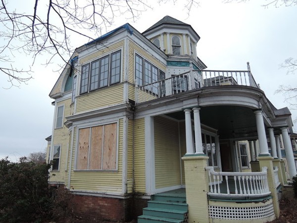 37 George Street Springfield, MA 01105 - Photo 2 of 28 a view of a house with a small yard and wooden floor and fence