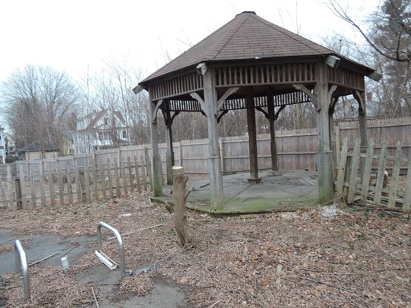 37 George Street Springfield, MA 01105 - Photo 6 of 28 a view of a wooden house with large trees