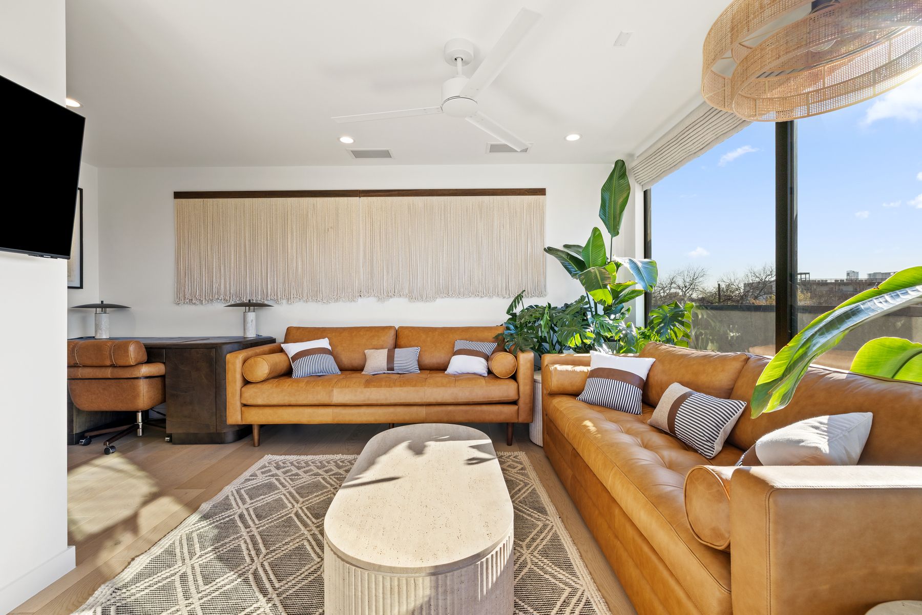 1304 Comal Street Austin, TX 78702 - Photo 22 of 39 a living room with furniture and a flat screen tv