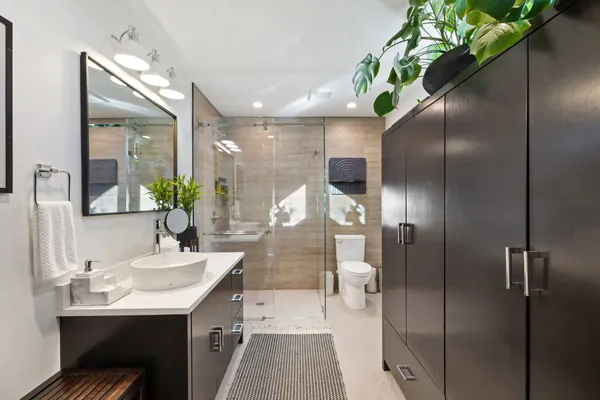 a bathroom with a sink and mirror