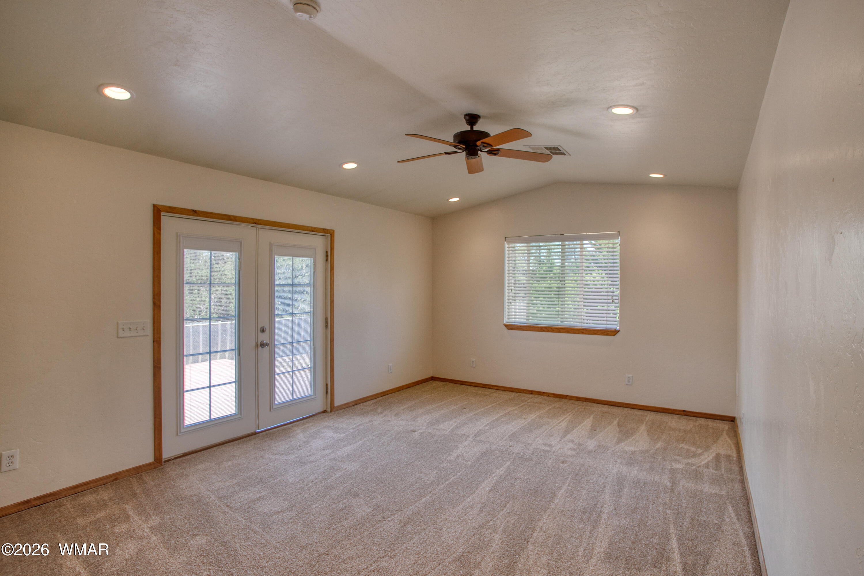 411 West Stratton Show Low, AZ 85901 - Photo 9 of 47 a view of an empty room with a window