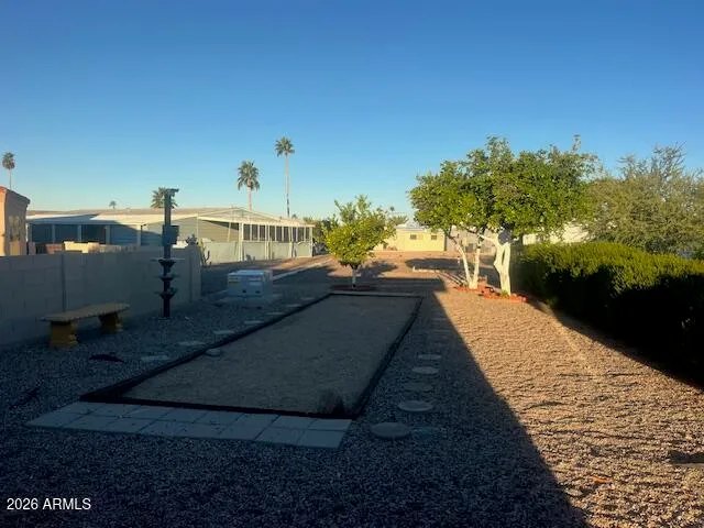 a view of a house with backyard