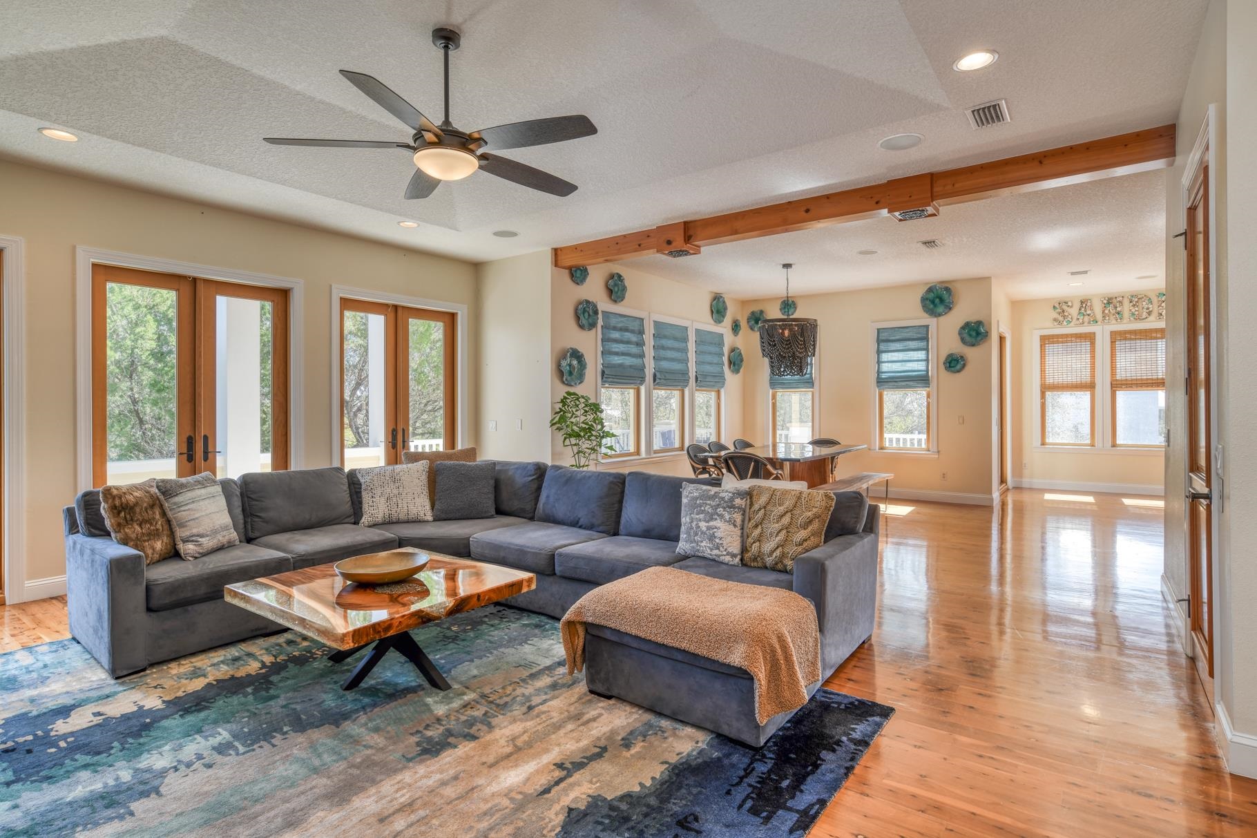 201 North Forest Dune Drive St. Augustine Beach, FL 32080 - Photo 21 of 57 a living room with furniture and a large window