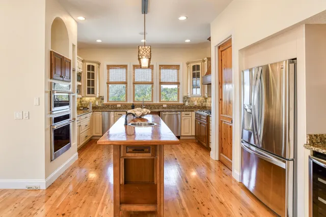 a view of a house with a small yard