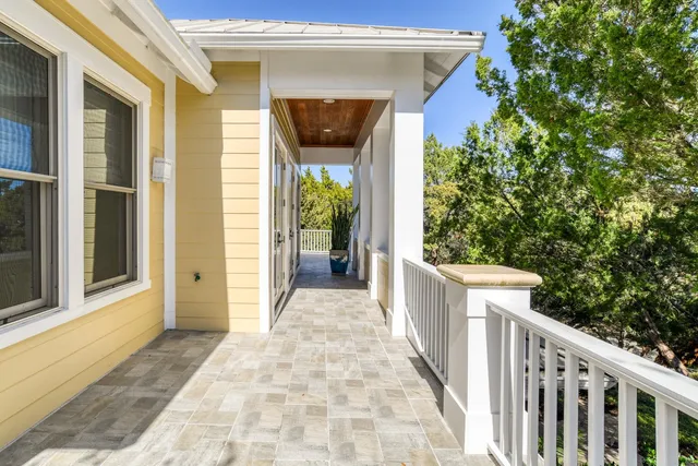 a view of a that has a bed and a window