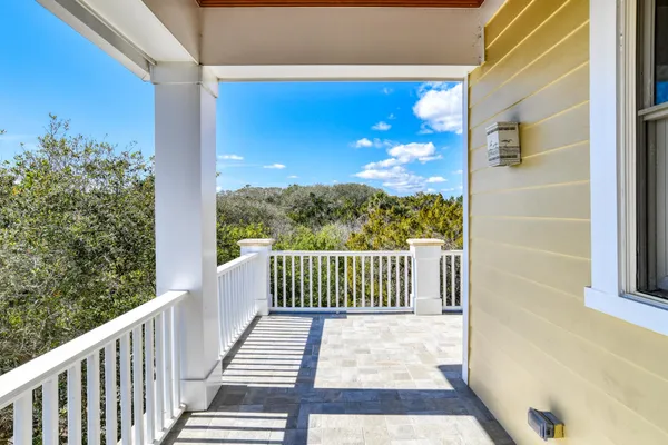a bathroom with a sink mirror and toilet