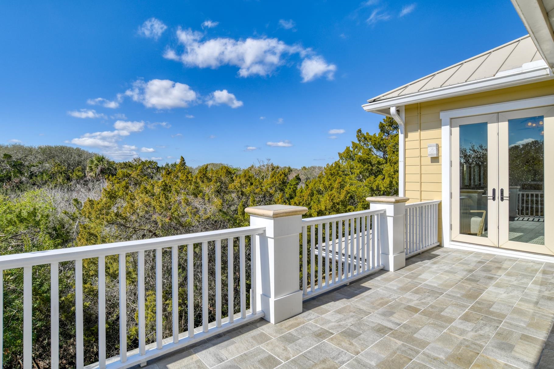 201 North Forest Dune Drive St. Augustine Beach, FL 32080 - Photo 32 of 57 a view of a balcony with an outdoor space