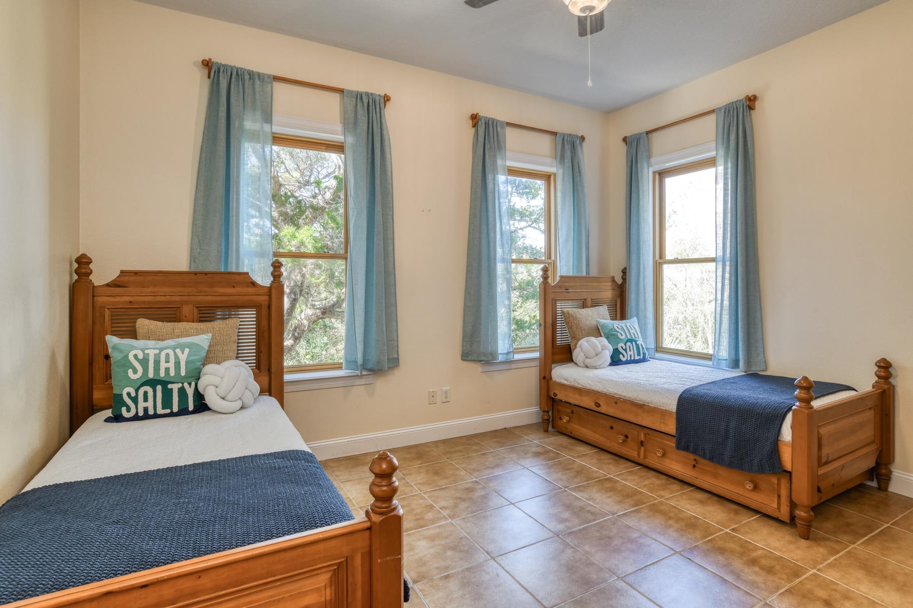 201 North Forest Dune Drive St. Augustine Beach, FL 32080 - Photo 5 of 57 a bedroom with a bed and window