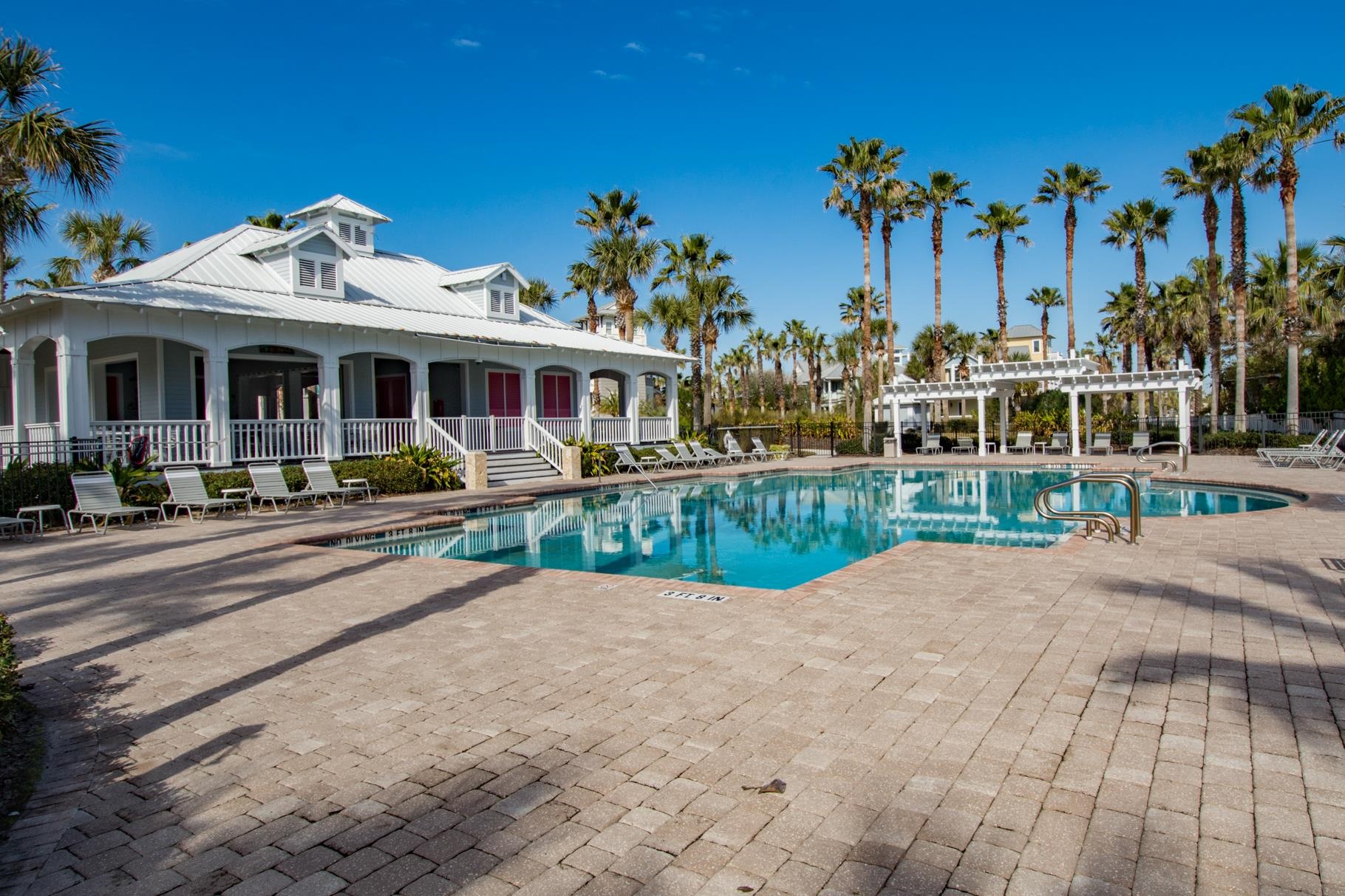 201 North Forest Dune Drive St. Augustine Beach, FL 32080 - Photo 52 of 57 a view of a water fountain in front of a building