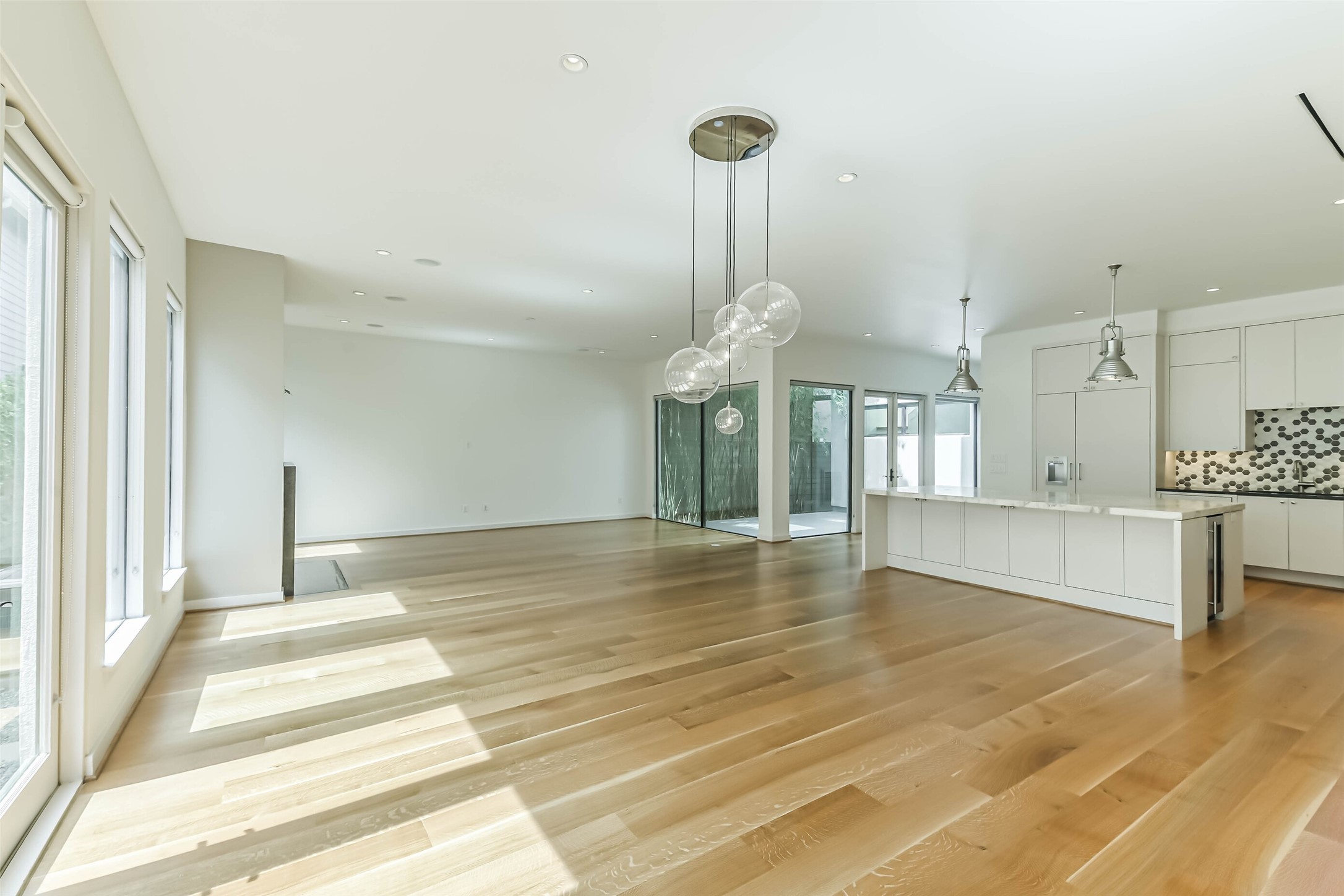 815 Alexander Street Houston, TX 77007 - Photo 23 of 49 Bright open-concept living and dining layout ideal for entertaining.