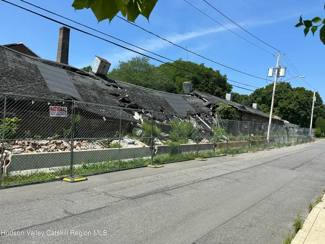 a view of a house with a street
