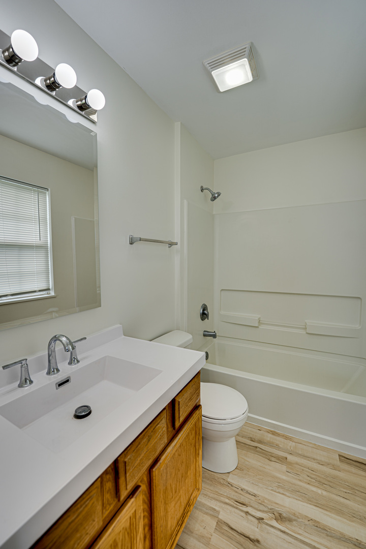 3821 Bailey Road, Unit 3821 Yorkville, IL 60560 - Photo 16 of 22 a bathroom with a sink a toilet and shower