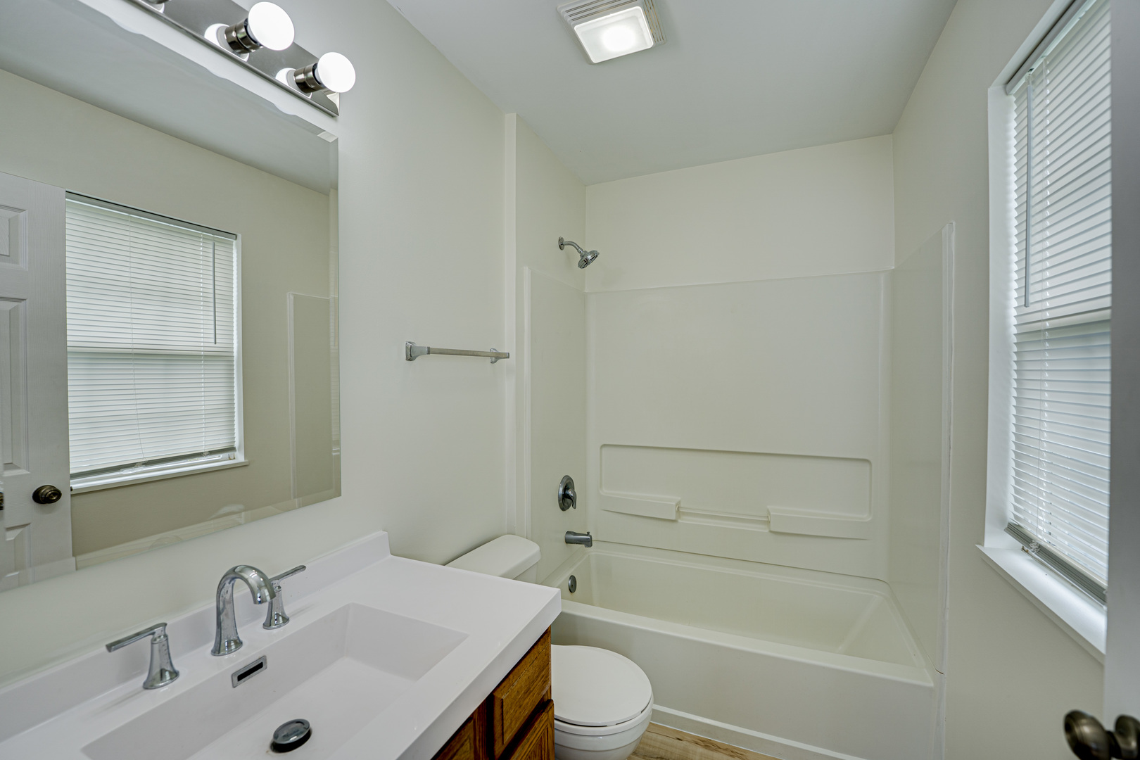 3821 Bailey Road, Unit 3821 Yorkville, IL 60560 - Photo 17 of 22 a bathroom with a sink toilet and shower