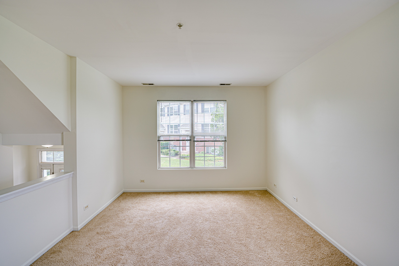 3821 Bailey Road, Unit 3821 Yorkville, IL 60560 - Photo 2 of 22 an empty room with a window