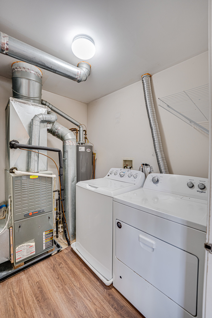 3821 Bailey Road, Unit 3821 Yorkville, IL 60560 - Photo 6 of 22 a utility room with cabinets