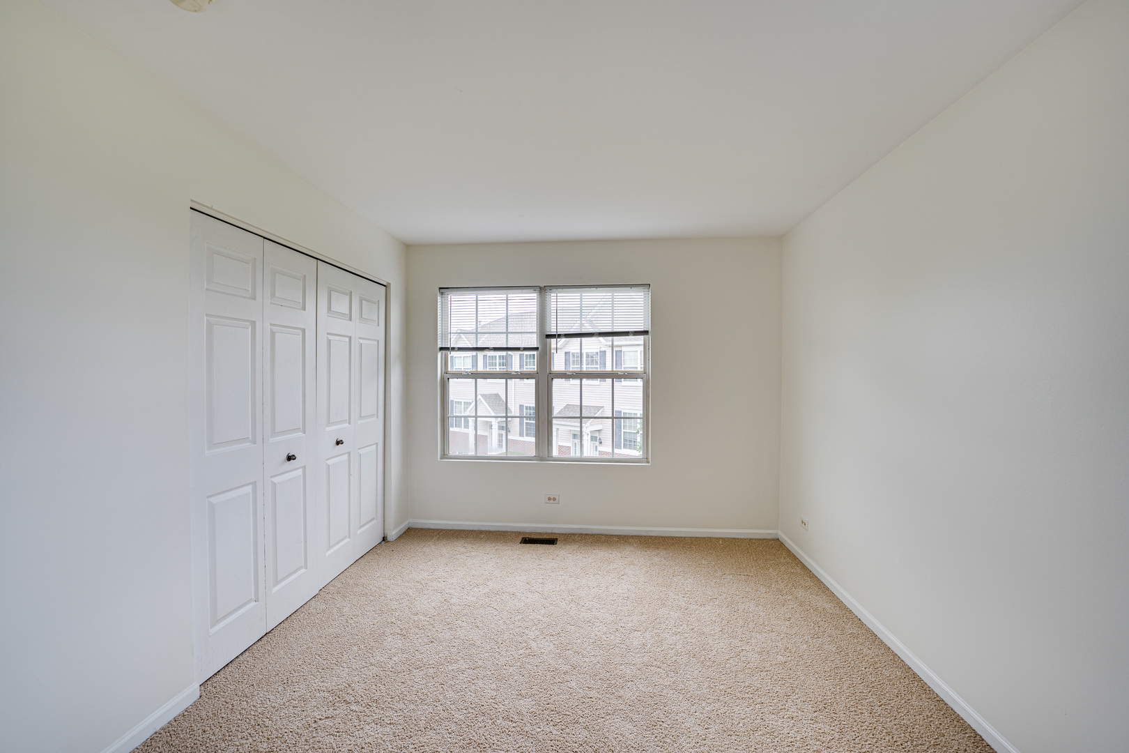 3821 Bailey Road, Unit 3821 Yorkville, IL 60560 - Photo 8 of 22 an empty room with a window