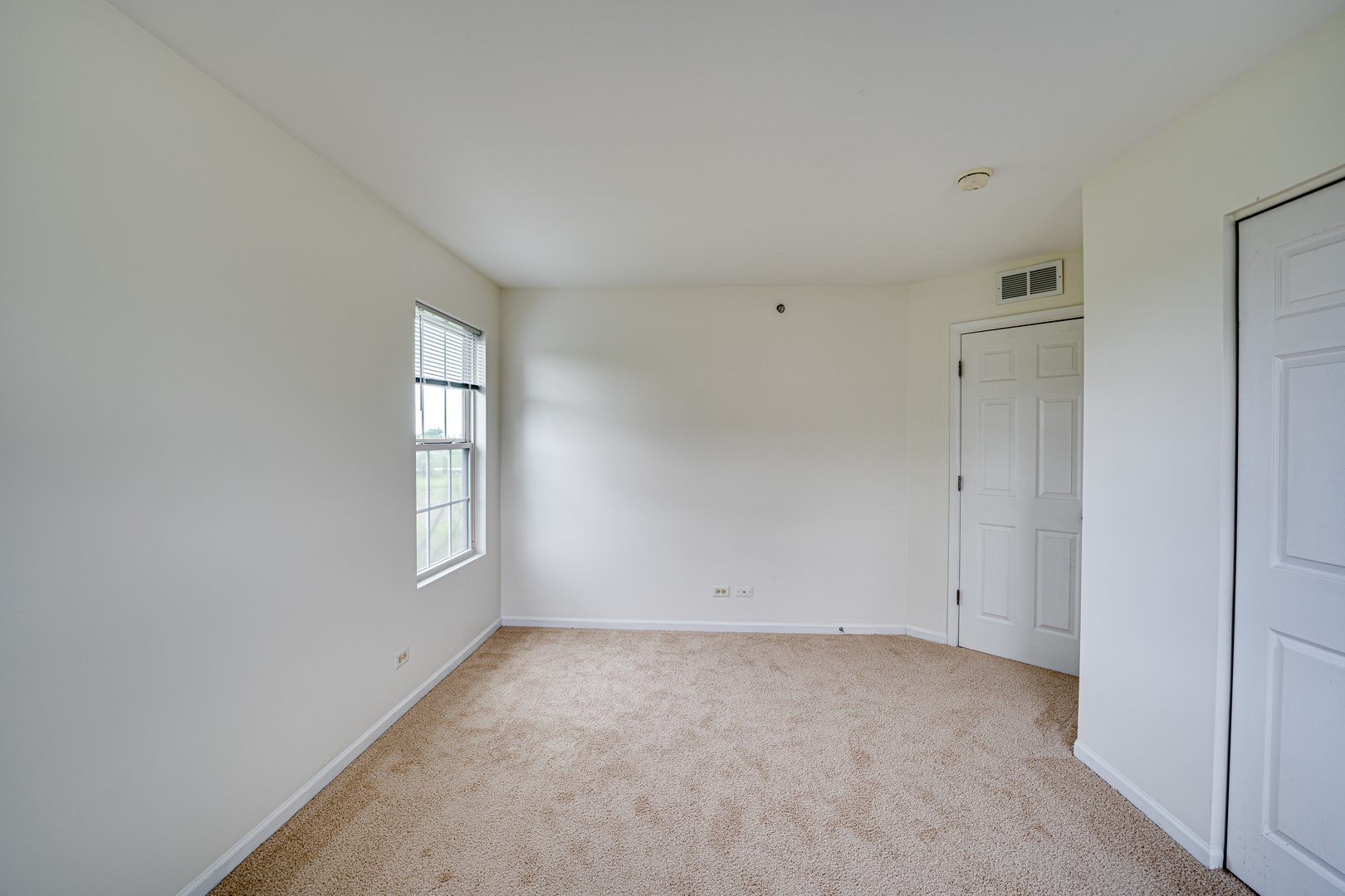 3821 Bailey Road, Unit 3821 Yorkville, IL 60560 - Photo 9 of 22 an empty room with windows
