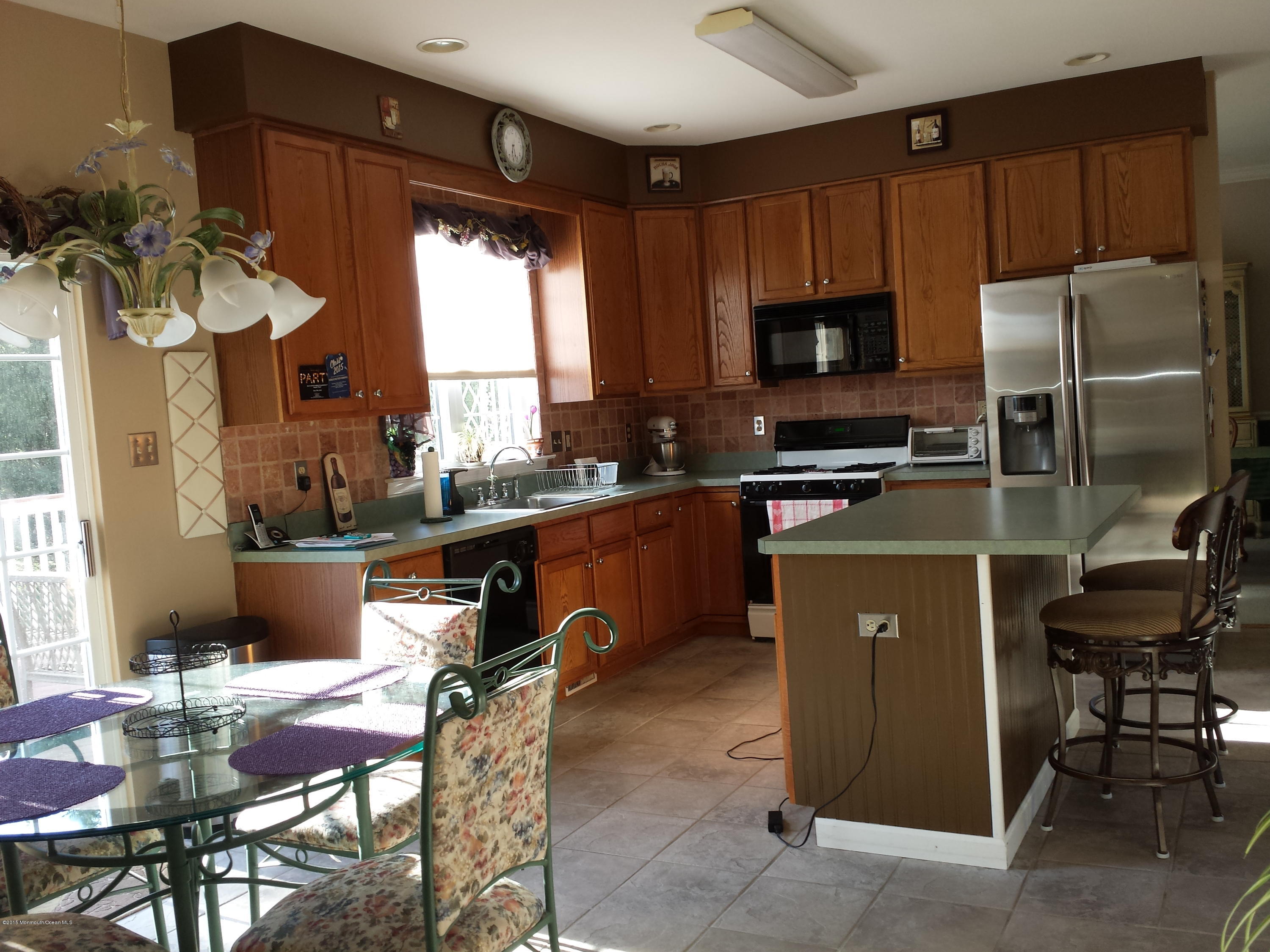 10 Grindstone Road Howell, NJ 07731 - Photo 3 of 14 Spacious eat in kitchen