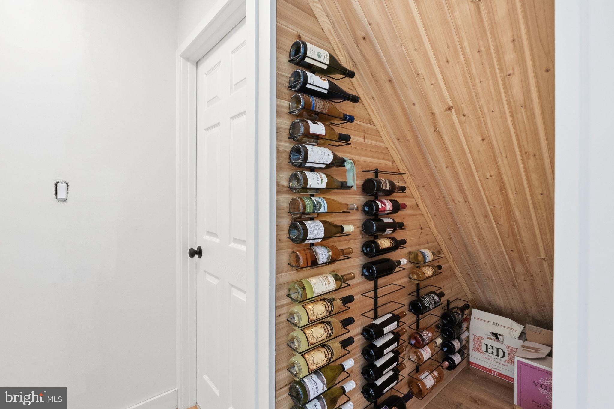 95 Cardinal Road Levittown, PA 19057 - Photo 29 of 40 Charming wine nook with wooden accents.
