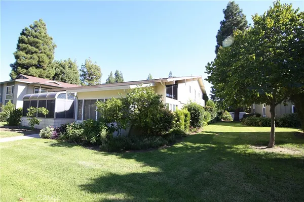 a view of a house with a garden