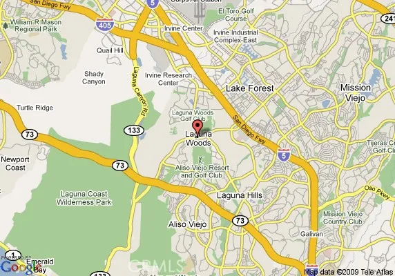 a view of a swimming pool with a yard