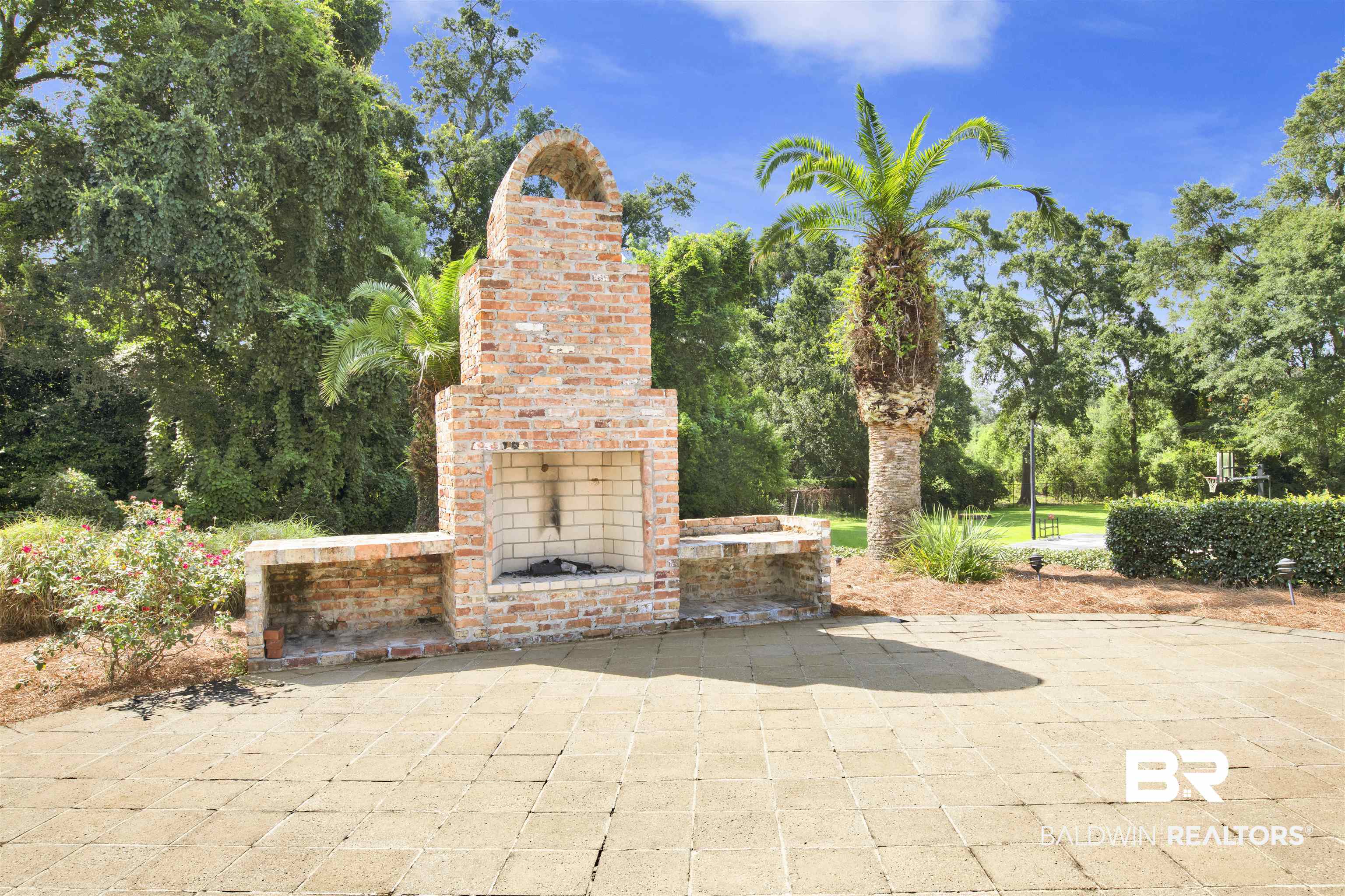 3816 Austill Lane Mobile, AL 36608 - Photo 68 of 80 View of patio with an outdoor brick fireplace