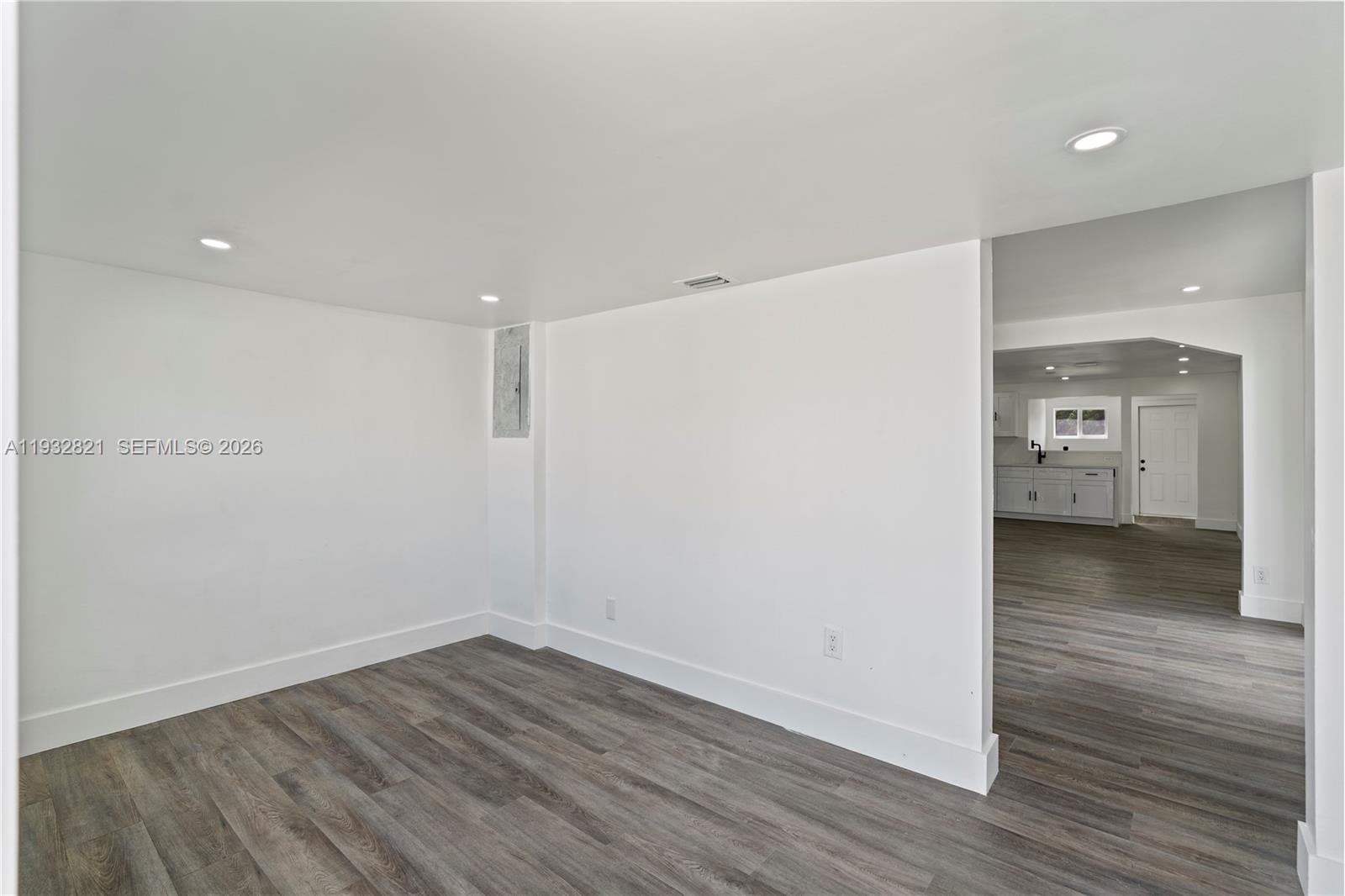 5658 Southwest 1st Street Miami, FL 33134 - Photo 11 of 50 a view of a room with wooden floor