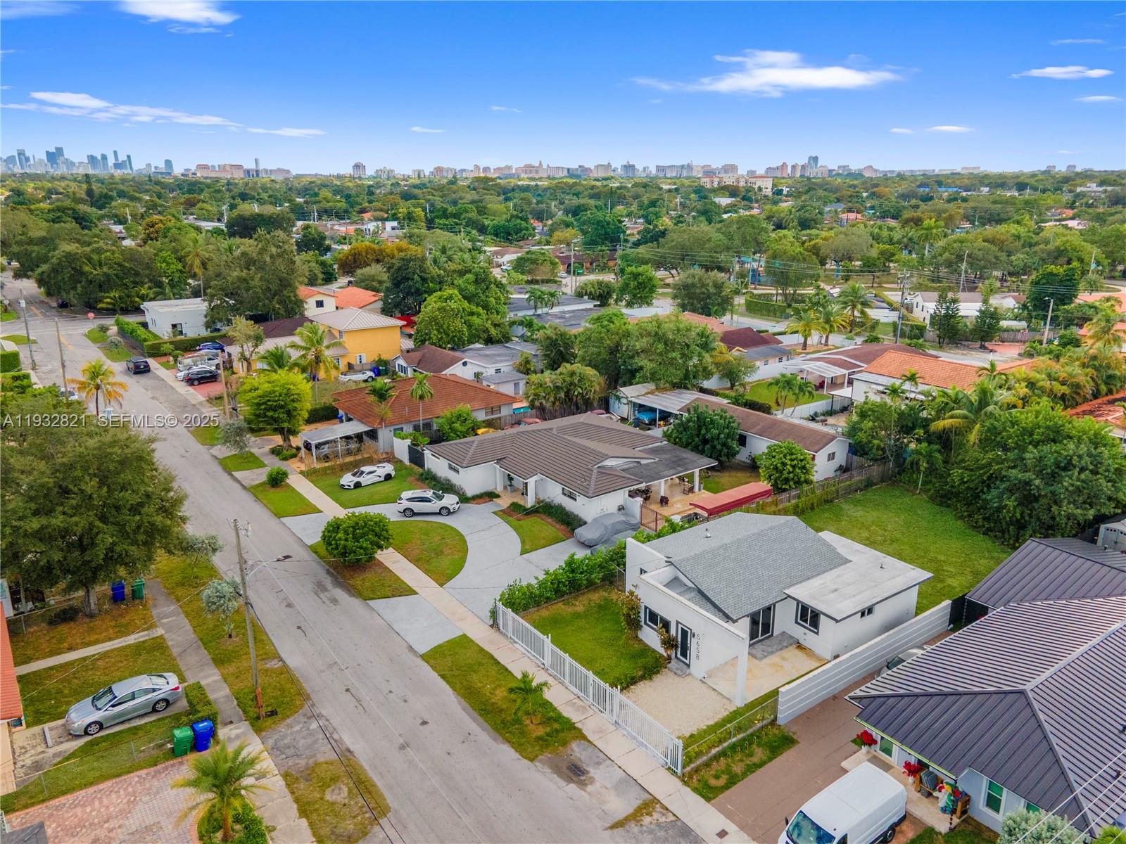 5658 Southwest 1st Street Miami, FL 33134 - Photo 2 of 41 an aerial view of a house with a garden