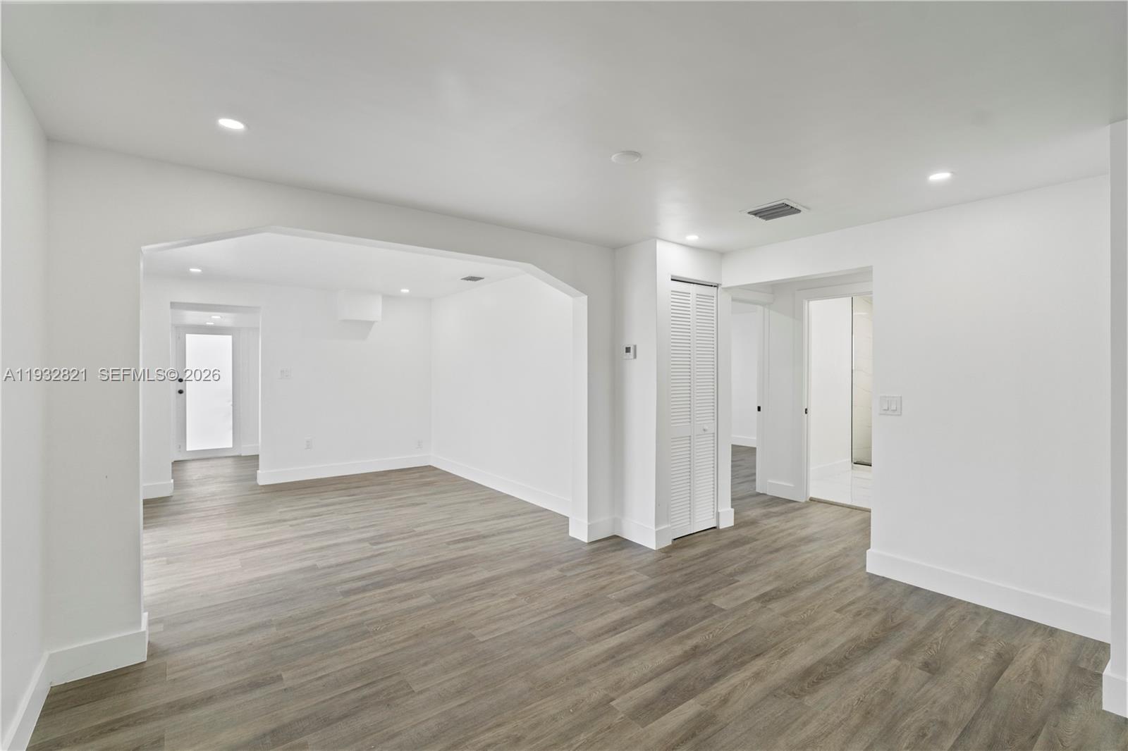 5658 Southwest 1st Street Miami, FL 33134 - Photo 21 of 50 wooden floor in an empty room with wooden floor