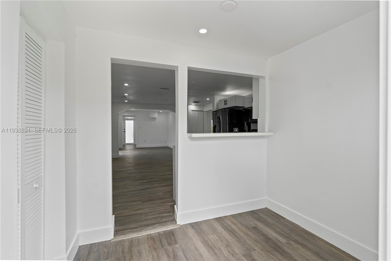 5658 Southwest 1st Street Miami, FL 33134 - Photo 26 of 50 wooden floor in an empty room