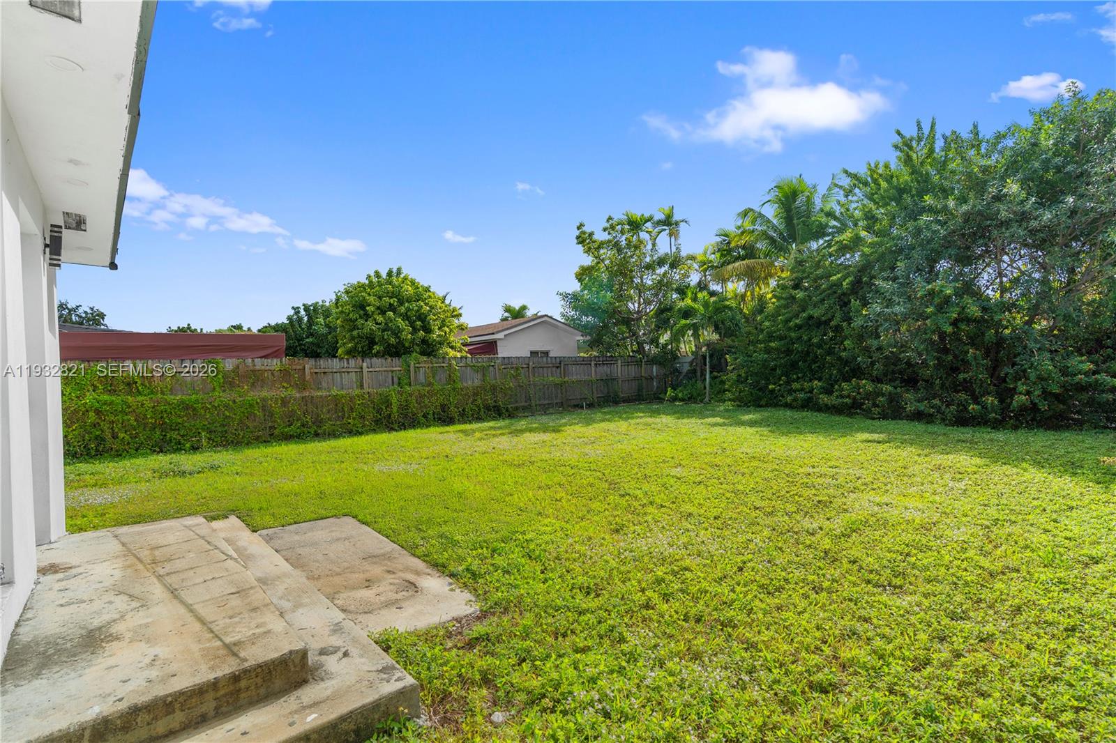 5658 Southwest 1st Street Miami, FL 33134 - Photo 45 of 50 a view of a yard and basketball court
