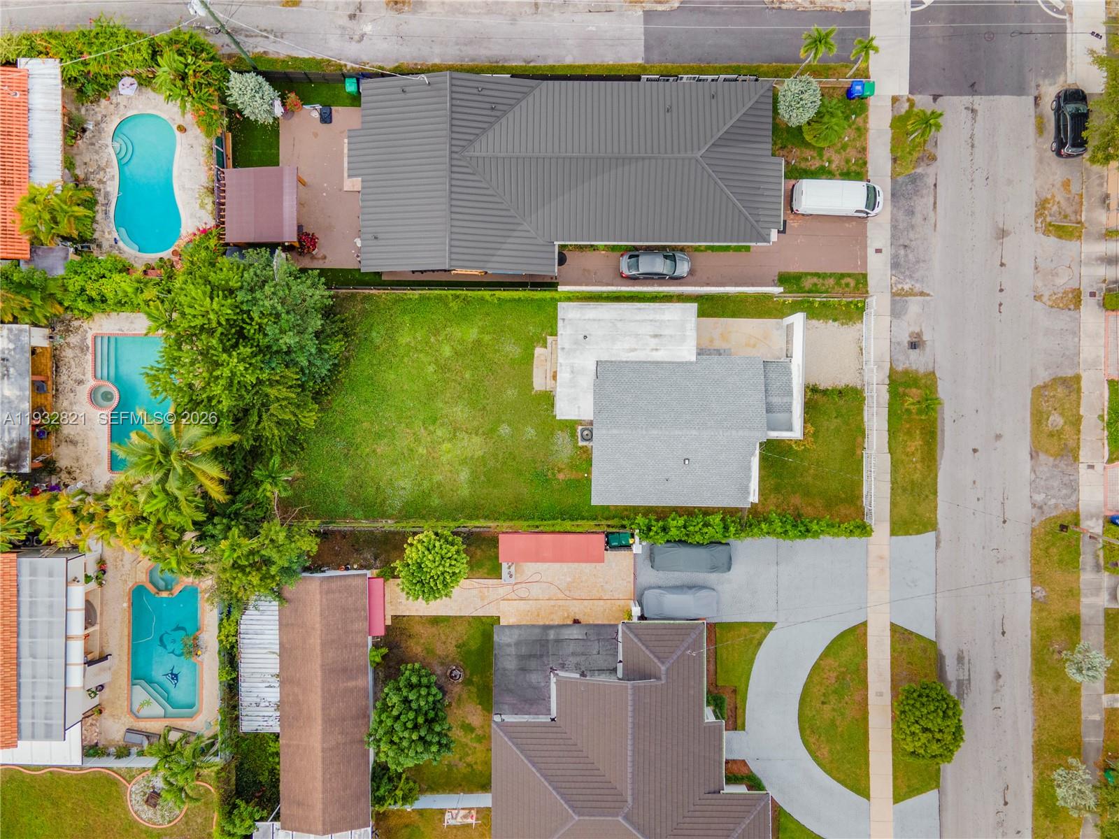 5658 Southwest 1st Street Miami, FL 33134 - Photo 50 of 50 an aerial view of residential house with outdoor space and swimming pool