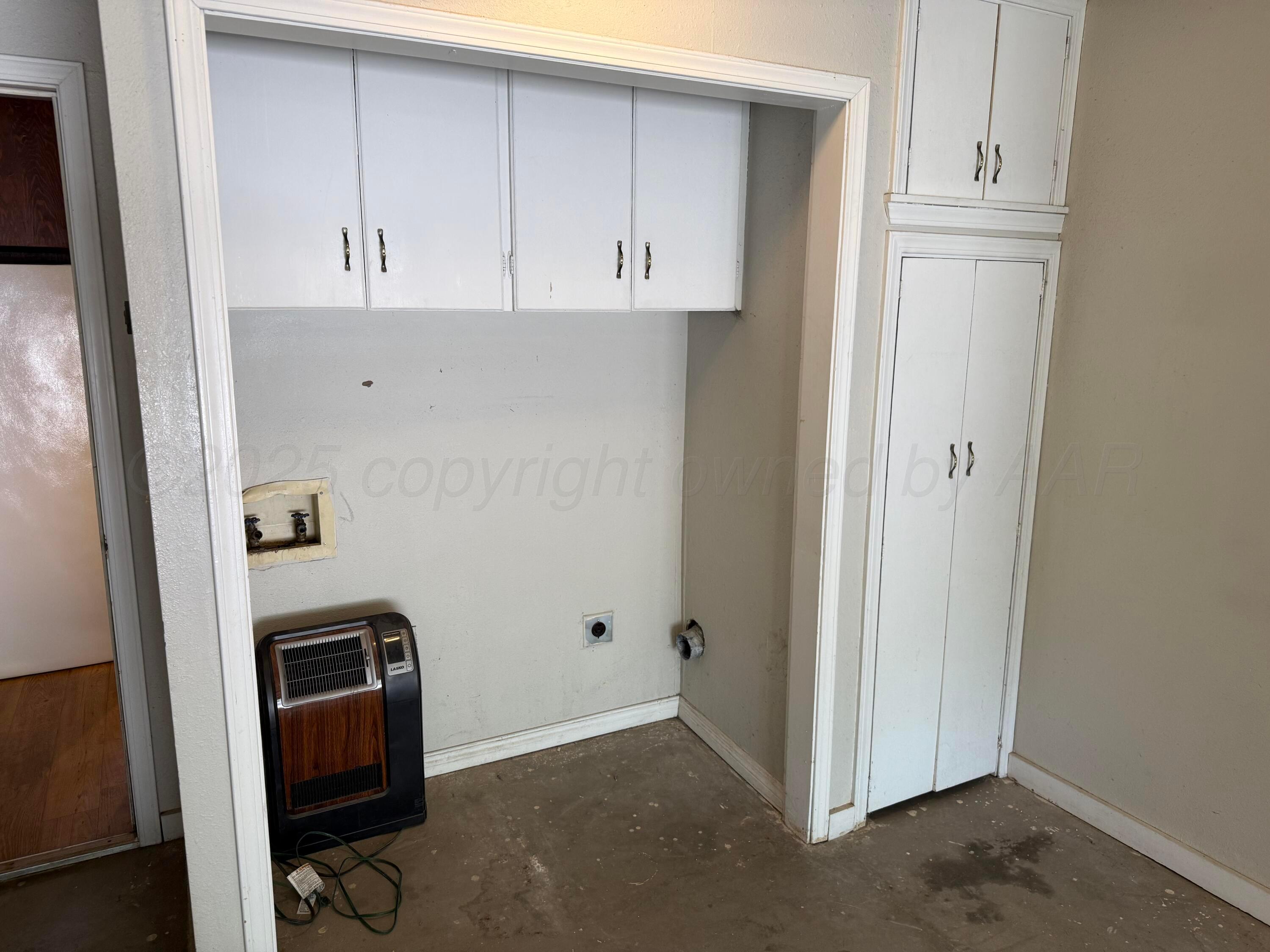 505 Harrell Lane Canyon, TX 79015 - Photo 12 of 14 a view of cabinets and wooden floor