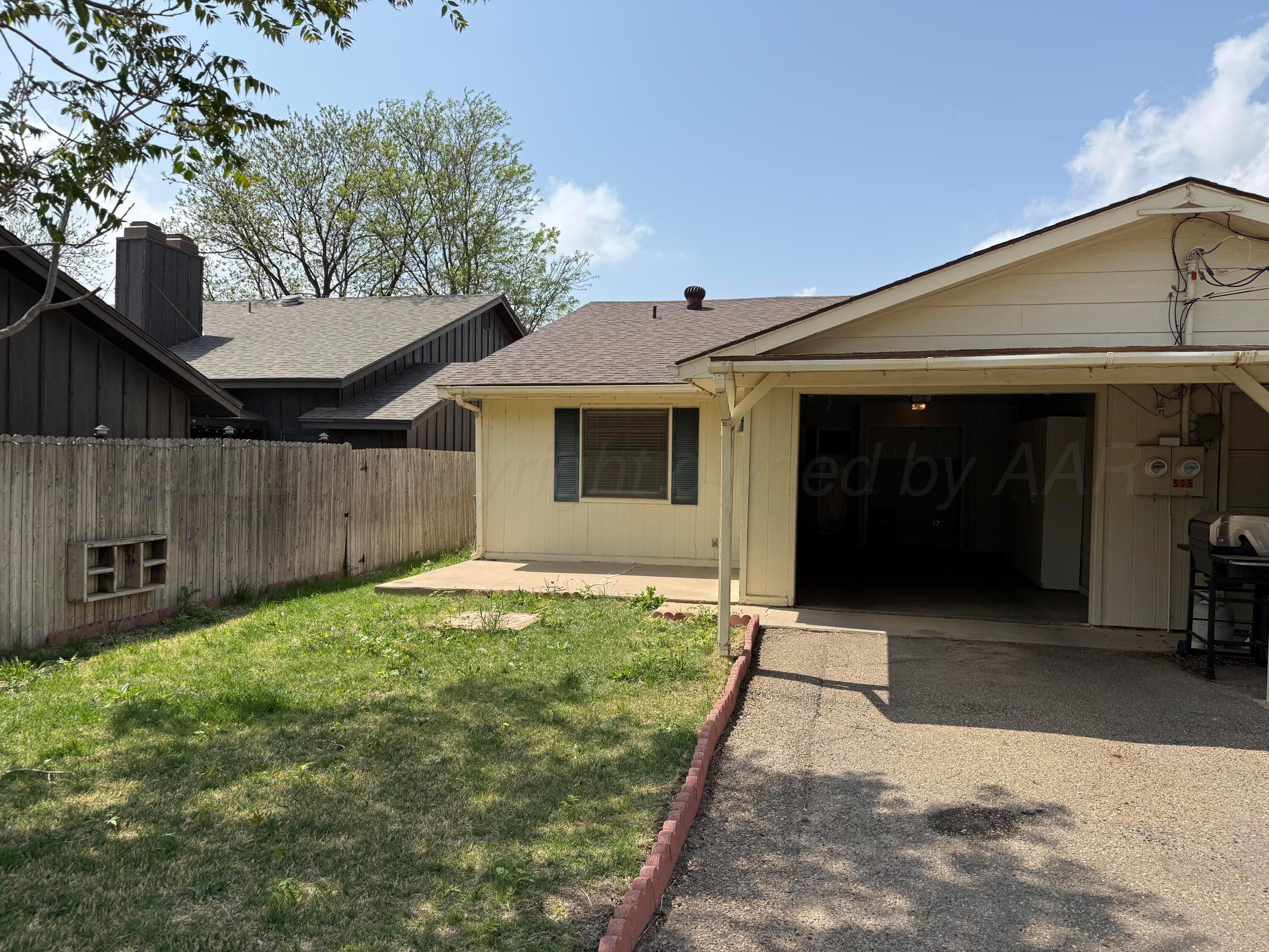 505 Harrell Lane Canyon, TX 79015 - Photo 13 of 14 a view of a house with a yard