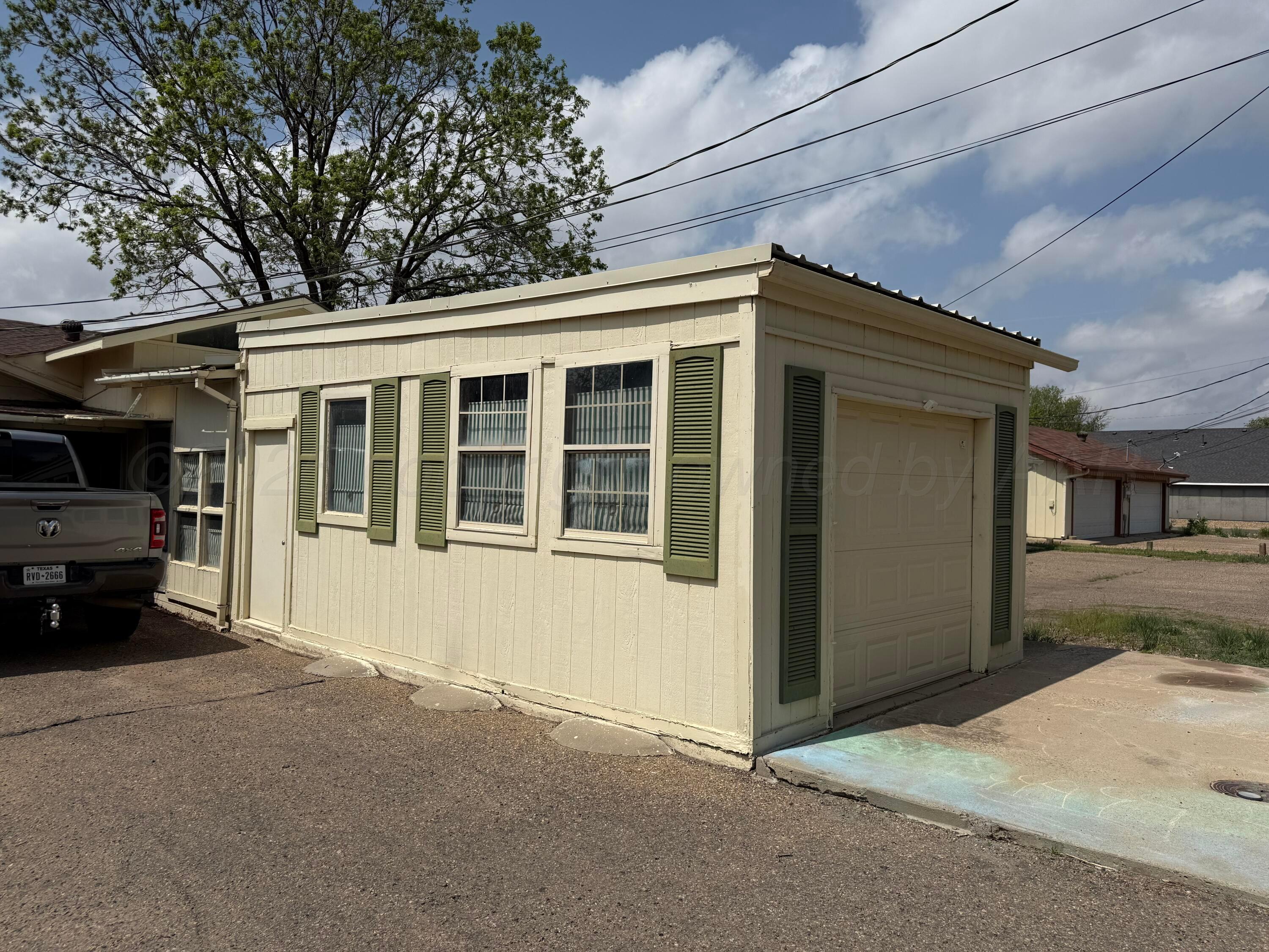 505 Harrell Lane Canyon, TX 79015 - Photo 14 of 14 a view of a house with a large space and a car parked beside it